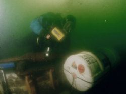 A diver investigates why this liferaft didn't deploy when... by Michael Grebler 